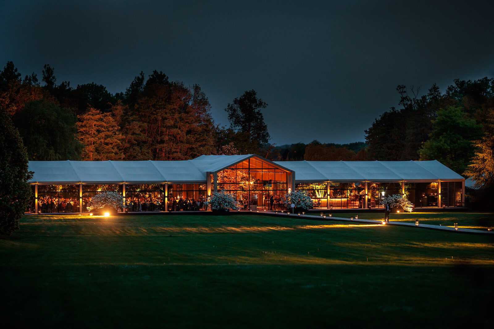 Across the entire width of the tent, guests had a view of the beautiful garden.